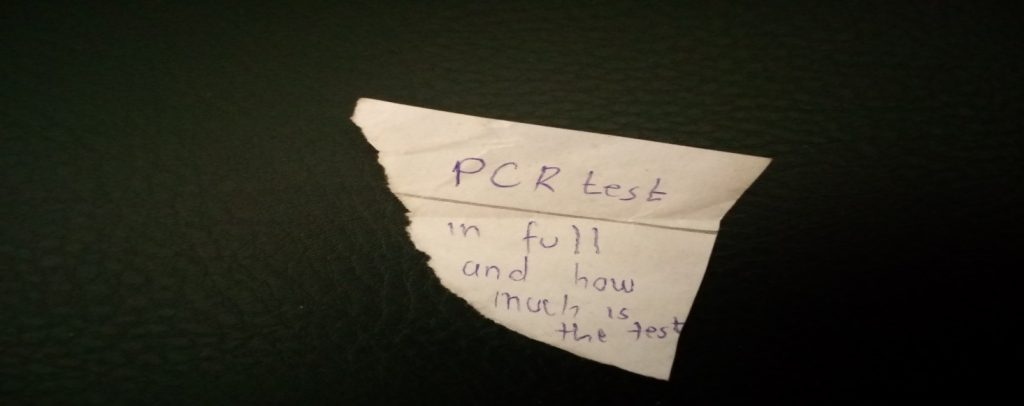 Handwritten student question: PCR test in full, and how much is the test?